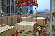 Finished wooden crate transport on the ship's floor